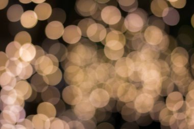 Altın rengi bokeh zarif soyut arkaplan ve bokeh odaklı ışıklar