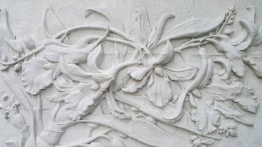 Beyaz arka planda beyaz taş çimento orkidesi sıva