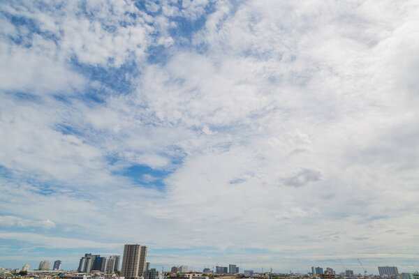 Blue sky clouds nature background on the city