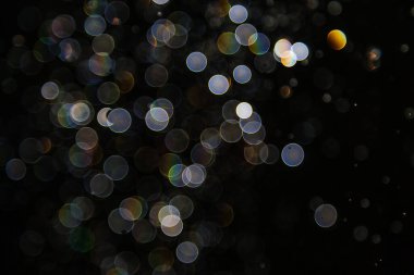 Siyah arkaplanda ışık bokeh