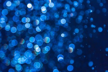 Mavi parıltılı bokeh ışıkları bokeh odaklanmamış arkaplan