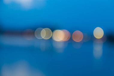 Mavi arkaplanda Bokeh Işıkları