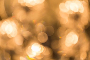 Arkaplan için altın bokeh kullanımının soyut arkaplanı