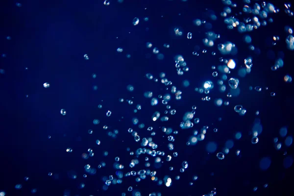Desenfoque Bokeh Gota Agua Sobre Fondo Azul — Foto de Stock