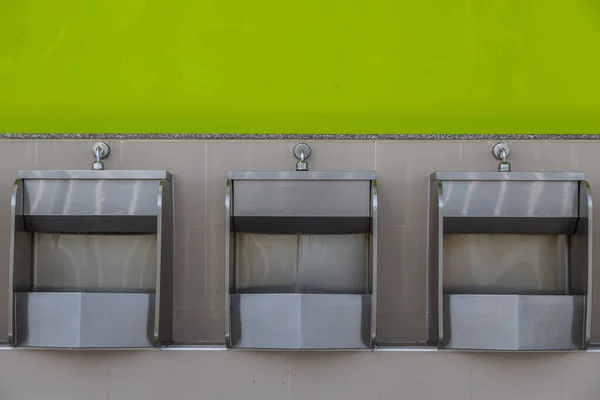 Row Stainless Steel Urinals Public Toilets Background — Stock Photo, Image