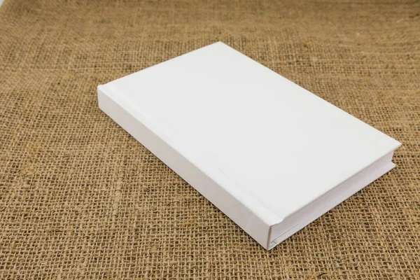 Biała Książka Worek Teksturowane Brązowe Tło — Zdjęcie stockowe