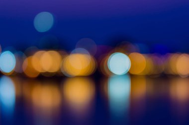 Şehir ışığı bulanık, soyut doku arkaplanının odak dışı bırakılması