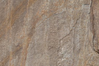Arkaplan için mermer kullanımının kahverengi taş yüzeyinin dokusu