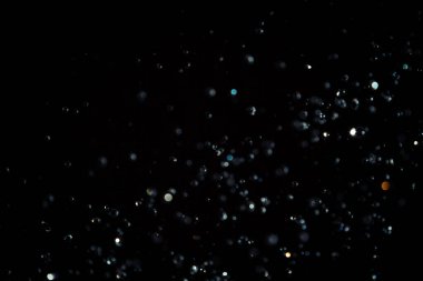 Siyah arkaplanda siyah bokeh dokusu