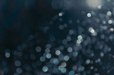 Siyah arkaplanda ışık bokeh