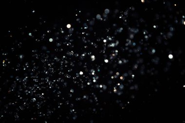 Siyah arkaplanda siyah bokeh dokusu