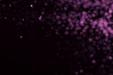 Siyah arkaplanda pembe bokeh