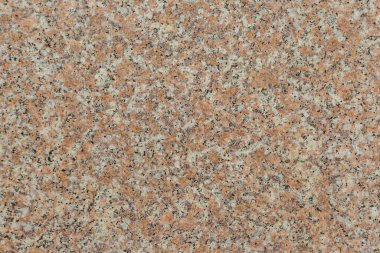 Parlak pembe granit arka plandan oluşan eski bir duvarın granit dokusu