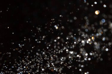 Siyah arkaplanda siyah bokeh dokusu