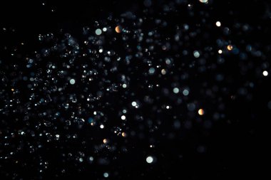 Siyah arkaplanda siyah bokeh dokusu