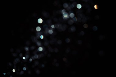 Siyah arkaplanda siyah bokeh dokusu