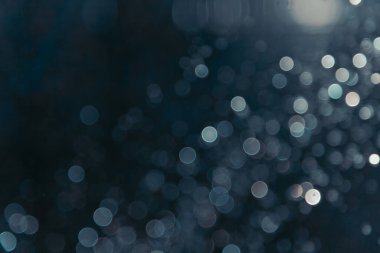 Siyah arkaplanda ışık bokeh