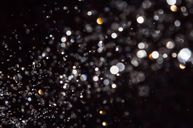 Siyah arkaplanda siyah bokeh dokusu
