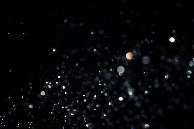 Siyah arkaplanda siyah bokeh dokusu