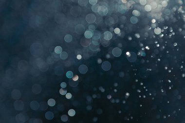 Siyah arkaplanda ışık bokeh