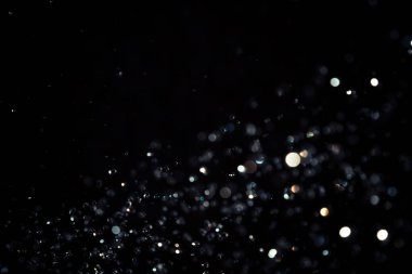 Siyah arkaplanda siyah bokeh dokusu