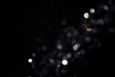 Siyah arkaplanda siyah bokeh dokusu