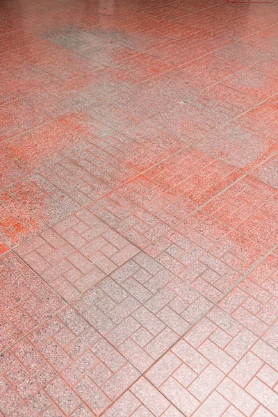 歩道の背景に赤レンガの敷石 — ストック写真