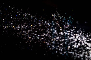 Su damlası tarafından soyut siyah bokeh arkaplanı