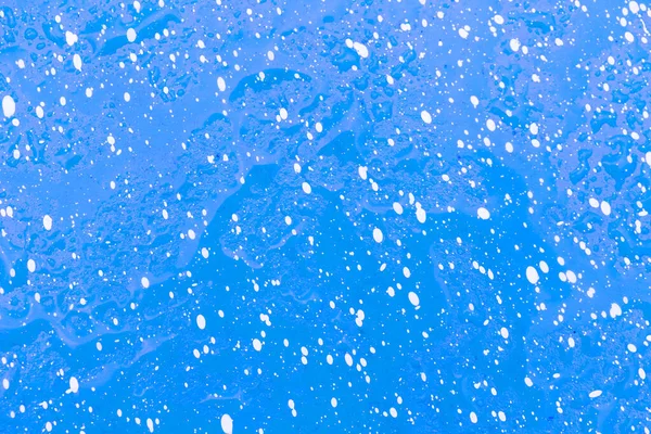 蓝点和白点上的水滴 用作背景 — 图库照片