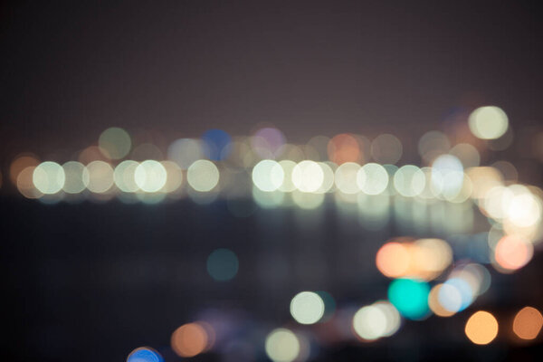 Vintage Blurred of bokeh city at night background