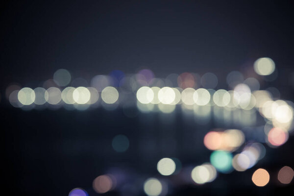 Vintage Blurred of bokeh city at night background
