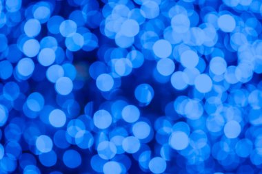 Siyah arkaplanda mavi bokeh
