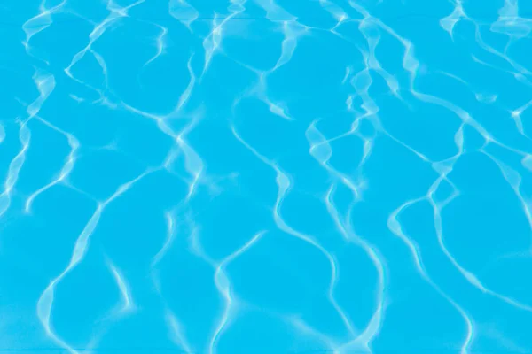 Niebieski Basen Woda Odbiciami Słońca Tło — Zdjęcie stockowe