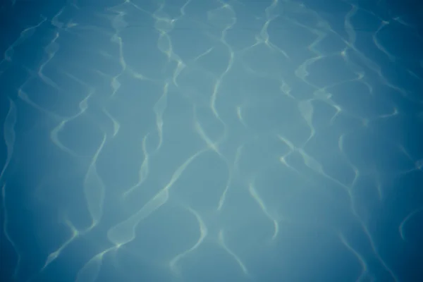 Niebieski Basen Woda Odbiciami Słońca Tło — Zdjęcie stockowe