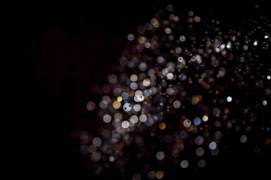 siyah arka plan üzerinde renkli bokeh