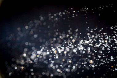 siyah arka plan üzerinde renkli bokeh