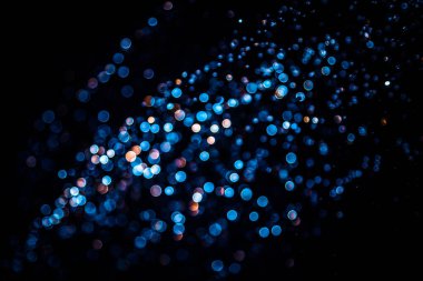 siyah arka plan üzerinde renkli bokeh