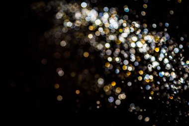 siyah arka plan üzerinde renkli bokeh