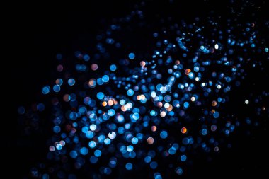 siyah arka plan üzerinde renkli bokeh