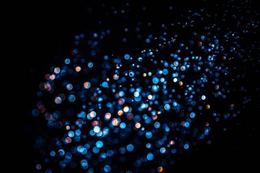 siyah arka plan üzerinde renkli bokeh