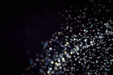 siyah arka plan üzerinde renkli bokeh