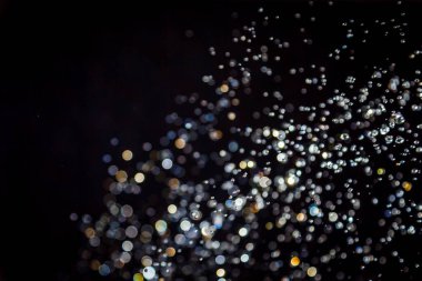 siyah arka plan üzerinde renkli bokeh
