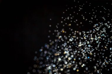 siyah arka plan üzerinde renkli bokeh