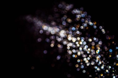 siyah arka plan üzerinde renkli bokeh