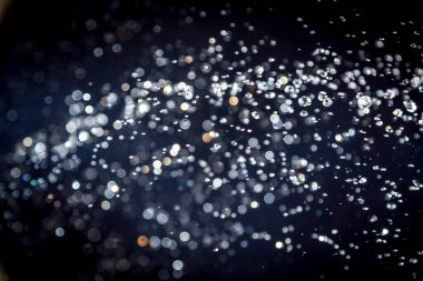 siyah arka plan üzerinde renkli bokeh