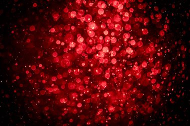 Görünür kırmızı noktalı bulanık fotoğraf, ışıl ışıl parlıyor. Duvar kağıdı olarak kullanılabilecek kadar lüks görünüyor.