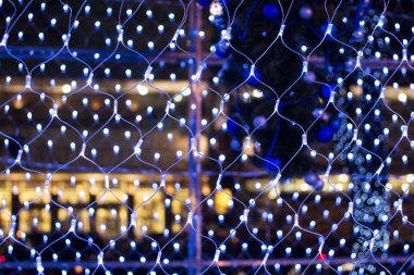 Noel çelenk ile renkli bokeh