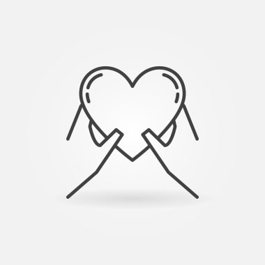 Kalp simgesini tutan eller