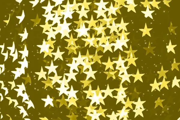Bintang berbentuk kabur kuning bokeh latar belakang dengan berkilau — Stok Foto