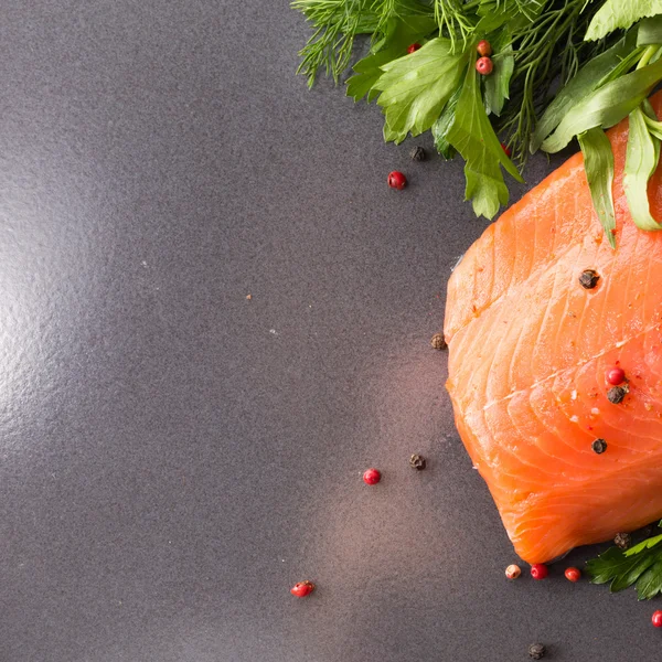 Salmon with seasoning on a pan — Stock Photo, Image